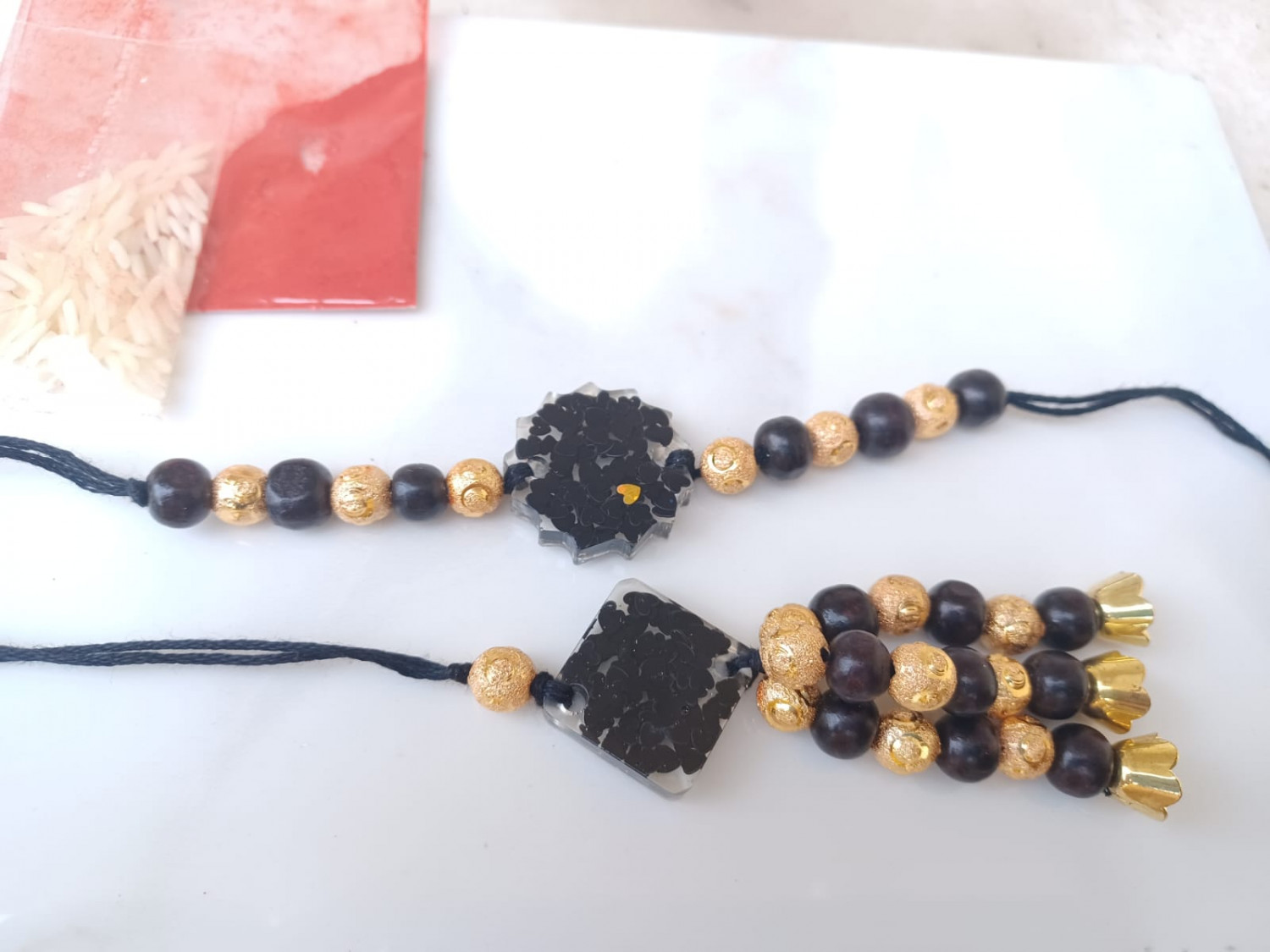 Black gold Rakhi Set
